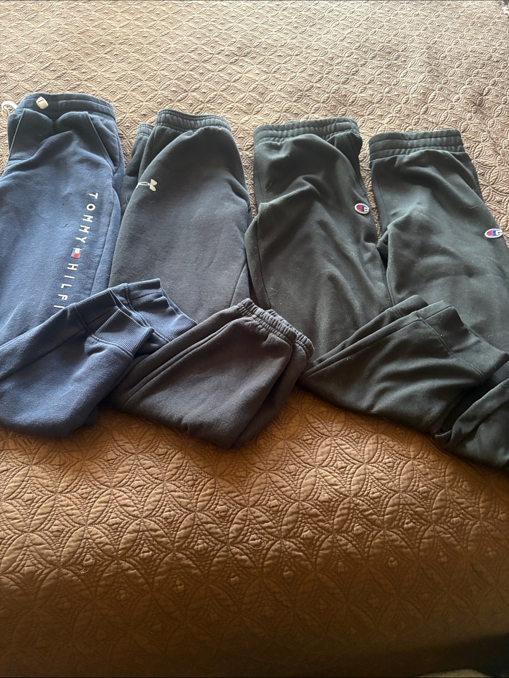4 sweatpants for boys about 10 years old.  Used, but enough good condition